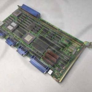 Pièce A16B1211086 004A FANUC en environnement de travail.
